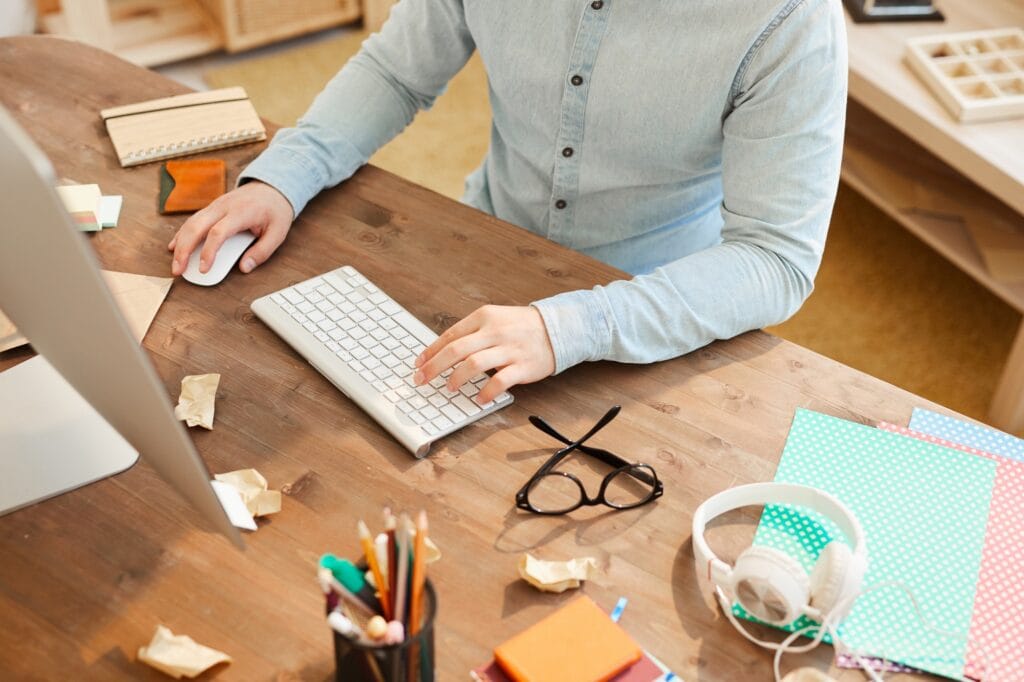 Web designer using computer